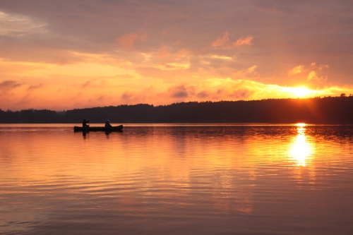 Dana and Weston paddling during sunset (Photo - Ryan Mallek)