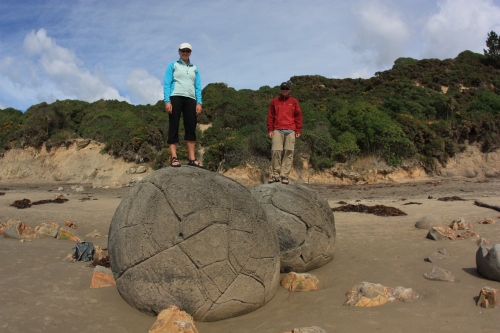 Dana and Weston atop the world on the New Zealand coast