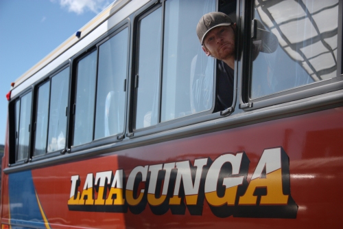 Ben sticking his head out of the bus window above one of my favorite city names in the world "Latacunga"