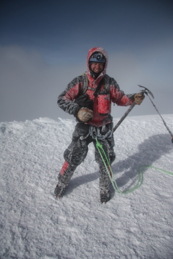 Weston celebrating on the summit of Cotopaxi