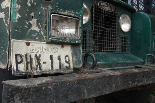 An old Land Rover that has seen better days on the streets of Banos Ecuador